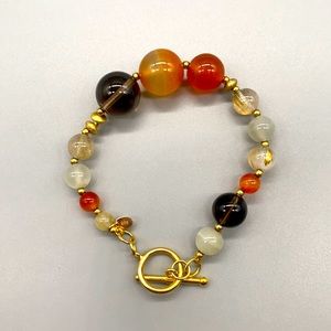 This is a beautiful multi-stone sterling silver W/ gold vermeil overlay size 7